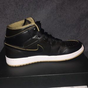 Air Jordan 1 Mid black and gold. Brand new.